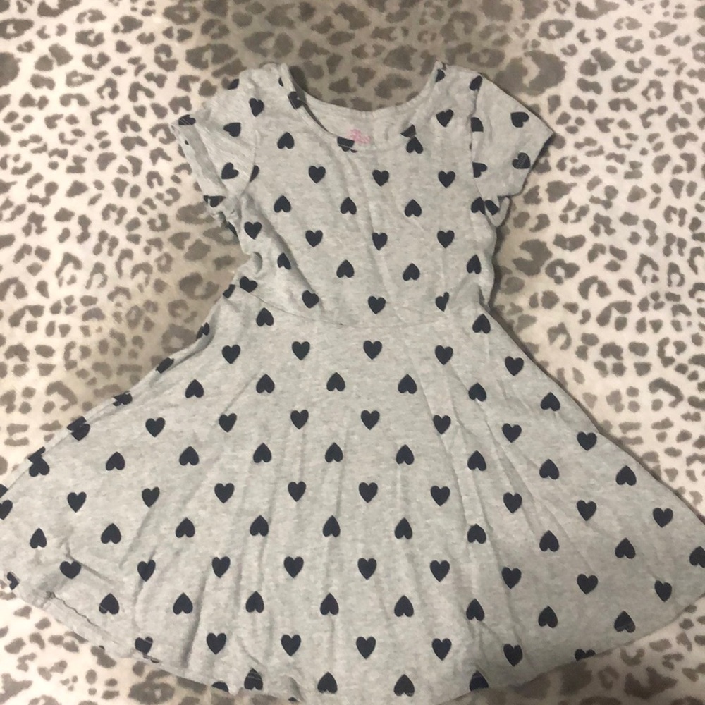 Girl’s short dress with hearts.